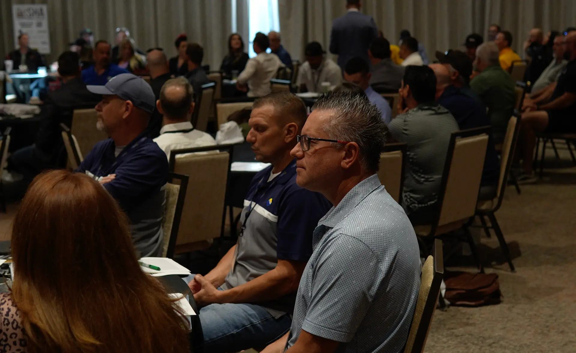 Contractors listening together in the Summit audience