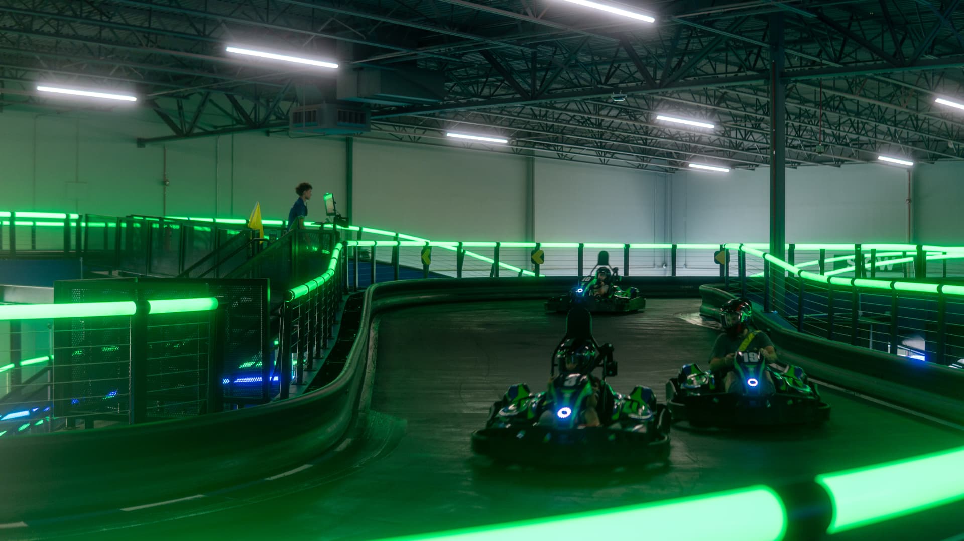 Kart racers on the Andretti track