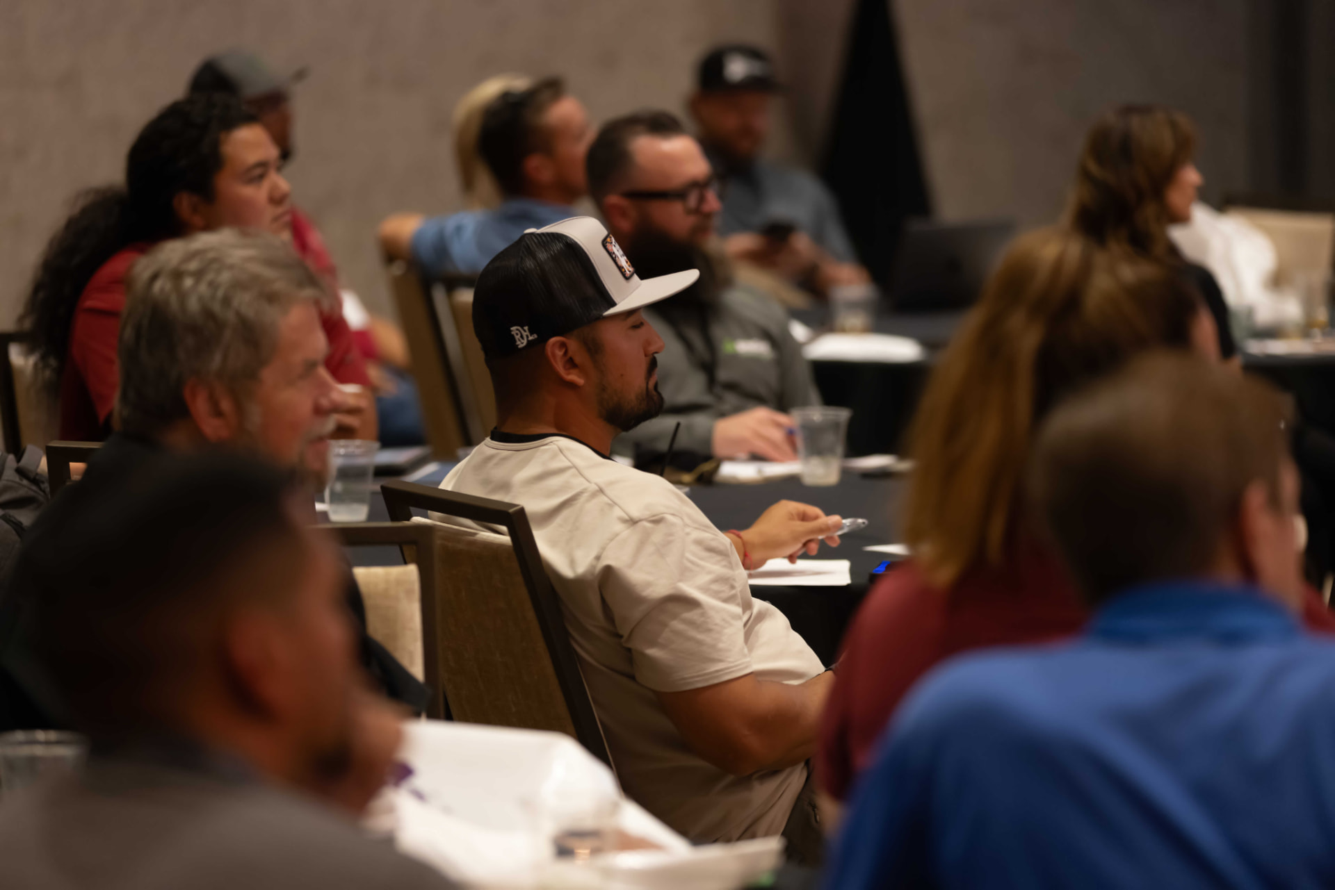 Attendees participating in a Summit session